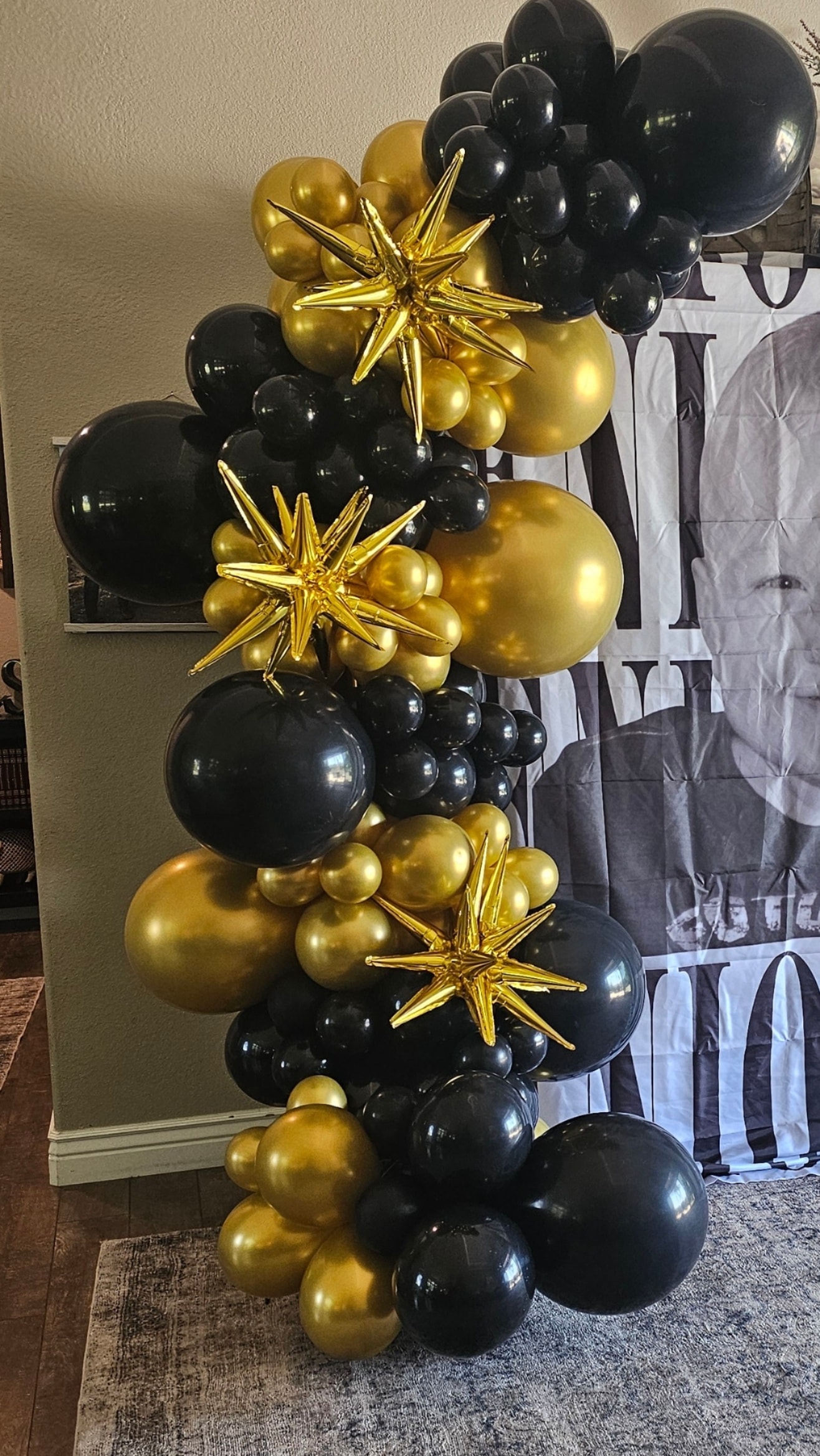 Black and gold balloon arrangements for events
